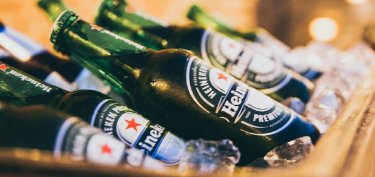 Heineken bottles placed inside a cooler box