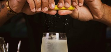 bartender preparing lemon soda